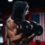 Woman in a Halloween Mask Exercising at the Gym